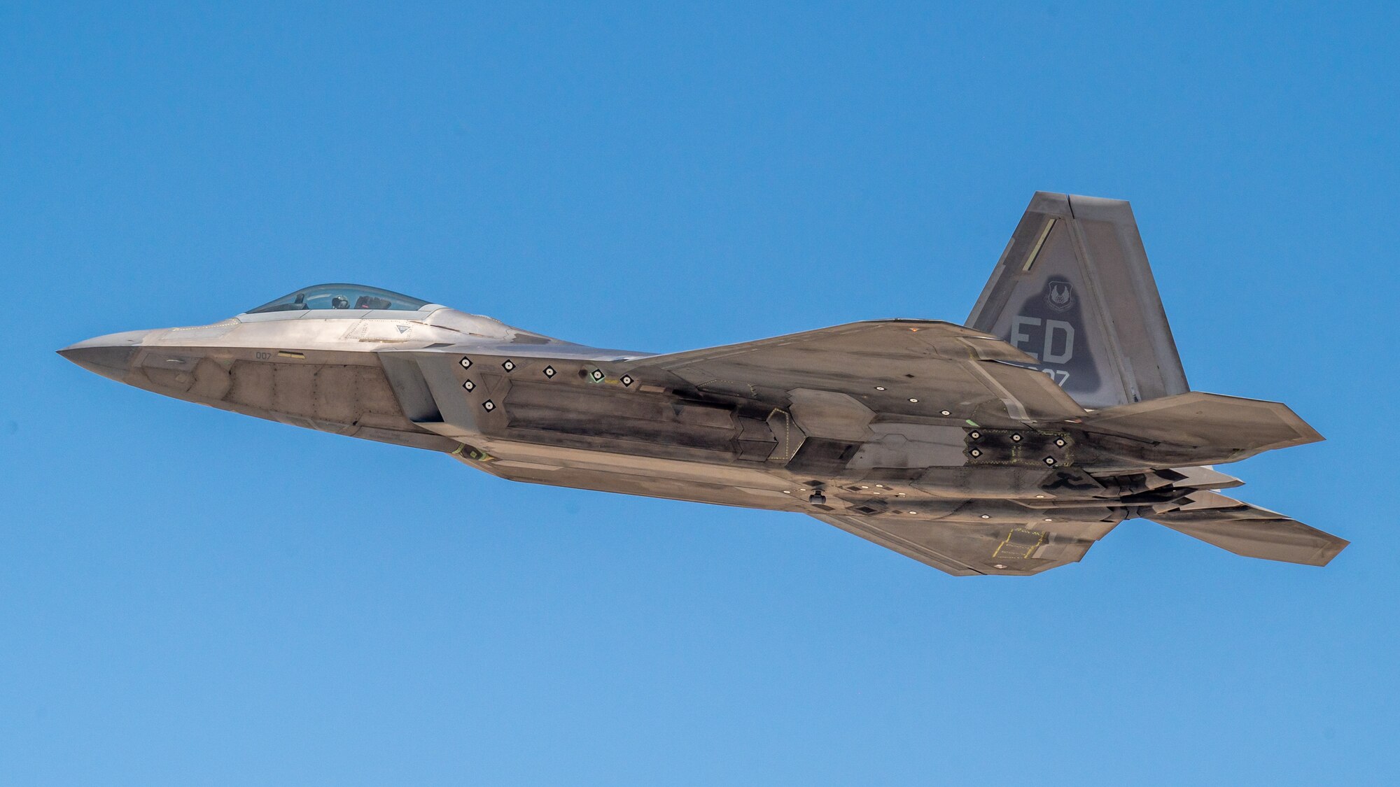 An F-22 Raptor from the 411th Flight Test Squadron, 412th Test Wing, flies over Edwards Air Force Base, California, Aug. 23. (Air Force photo by Giancarlo Casem)