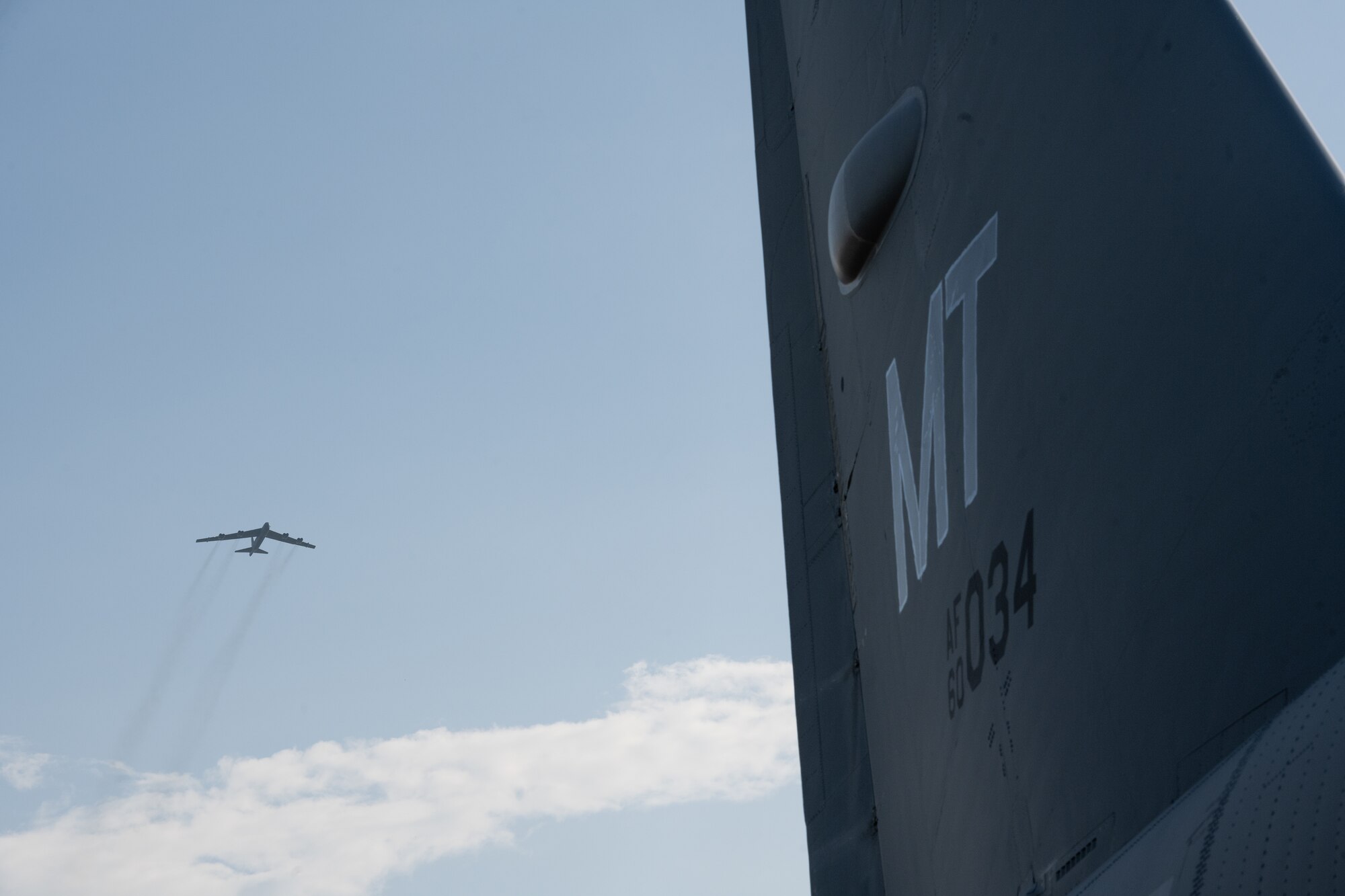 A U.S. Air Force B-52H Stratofortress assigned to the 23rd Bomb Squadron at Minot Air Force Base, North Dakota, sits on the flightline as another prepares to land at the Kualanamu International Airport in Medan, Indonesia, June 19, 2023. Two B-52s arrived in Indonesia to participate in bilateral training exercises, marking the first time U.S. Air Force B-52s had landed on Indonesian soil. (U.S. Air Force photo by Tech. Sgt. Zade Vadnais)