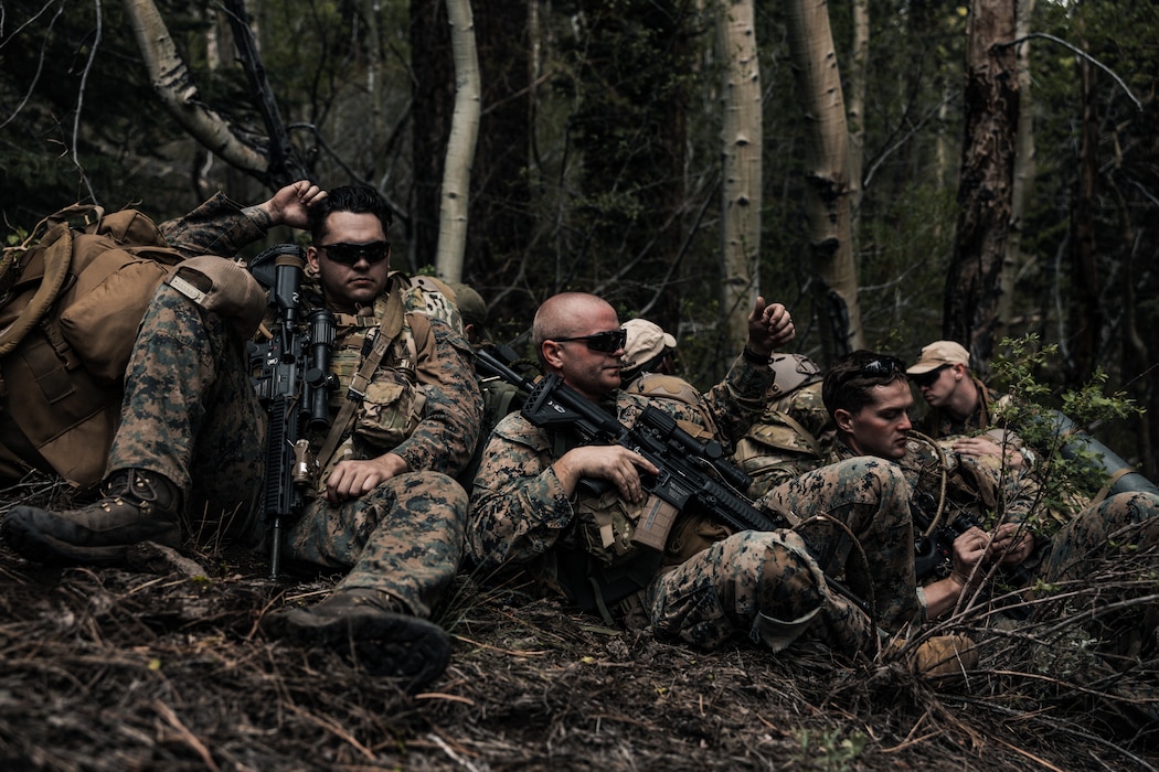 U.S. Marines with 4th Reconnaissance Battalion, 4th Marine Division, break from patrolling during Mountain Exercise (MTX) 4-23