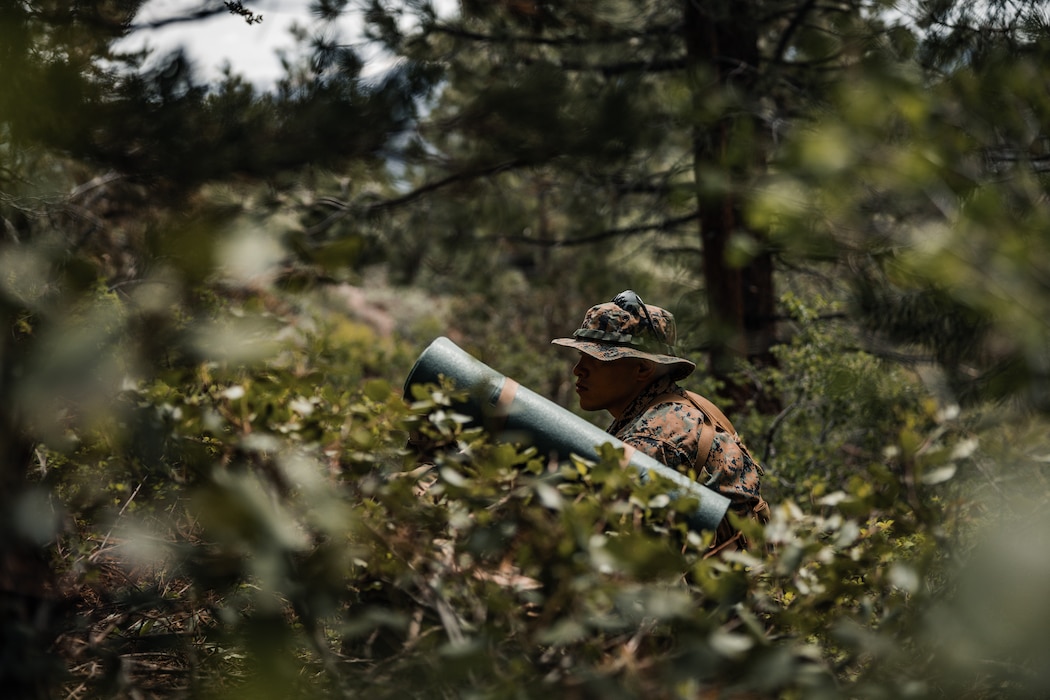 U.S. Marine Corps Lance Cpl. Javier Gonzalez, field radio operator with 4th Reconnaissance Battalion, 4th Marine Division, posts security during Mountain Exercise (MTX) 4-23