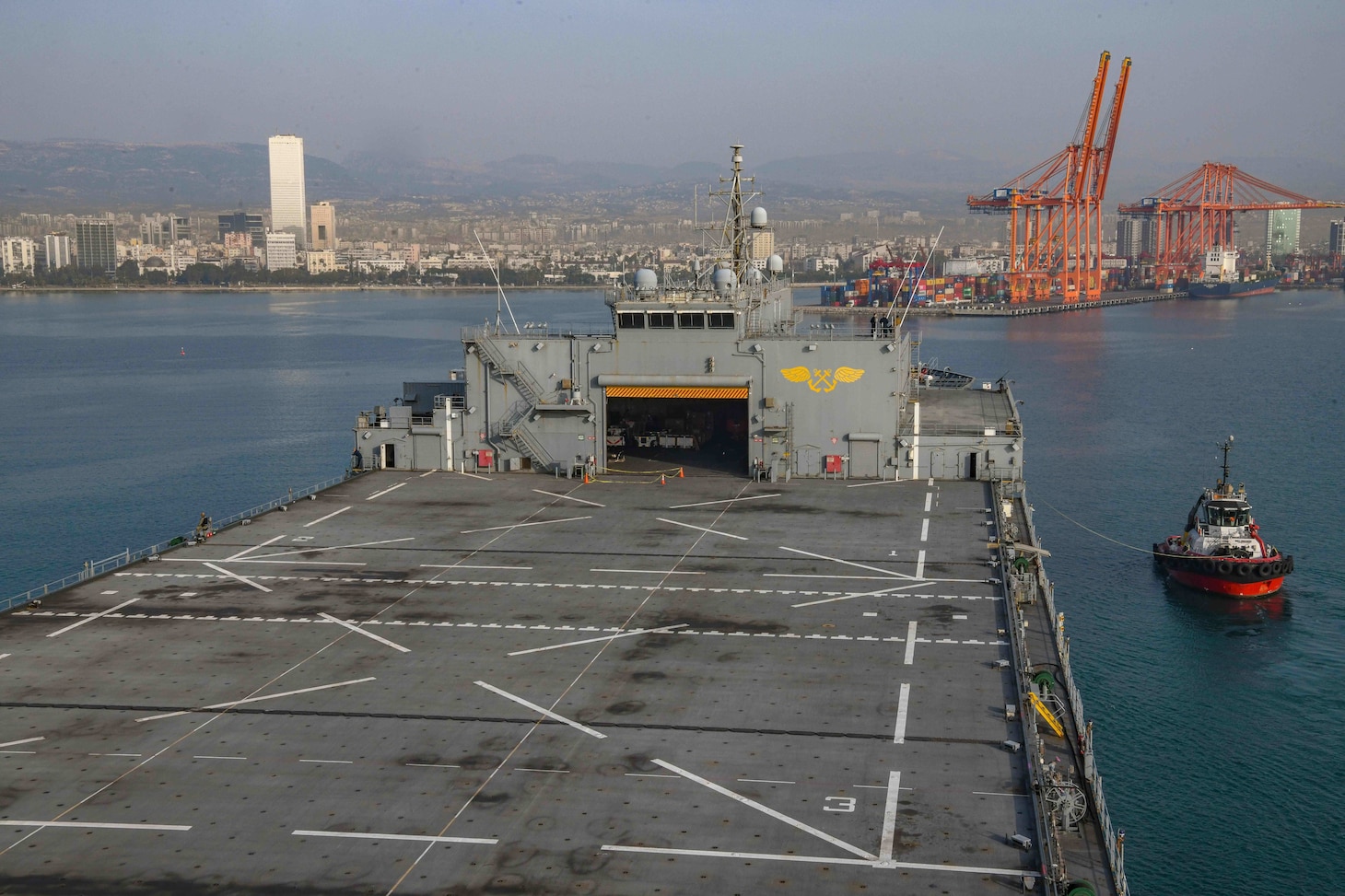 (Feb. 28, 2023) The USS Hershel "Woody" Williams (ESB 4) arrived in Mersin, Türkiye to deliver relief supplies to Turkish authorities for those affected by the earthquakes, Feb. 28, 2023.  At the request of the Turkish government, the Hershel “Woody” Williams is one of several U.S. military units, operating under U.S. Sixth Fleet, U.S. Naval Forces Europe (NAVEUR), and U.S. European Command as part of the Turkish earthquake relief efforts.