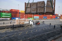 Feb. 28, 2023) U.S. Navy Sailors direct a supply offload after the USS Hershel "Woody" Williams (ESB 4) arrived in Mersin, Türkiye to deliver relief supplies to Turkish authorities for those affected by the earthquakes, Feb. 28, 2023.  At the request of the Turkish government, the Hershel “Woody” Williams is one of several U.S. military units, operating under U.S. Sixth Fleet, U.S. Naval Forces Europe (NAVEUR), and U.S. European Command as part of the Turkish earthquake relief efforts.