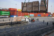 Feb. 28, 2023) U.S. Navy Sailors direct a supply offload after the USS Hershel "Woody" Williams (ESB 4) arrived in Mersin, Türkiye to deliver relief supplies to Turkish authorities for those affected by the earthquakes, Feb. 28, 2023.  At the request of the Turkish government, the Hershel “Woody” Williams is one of several U.S. military units, operating under U.S. Sixth Fleet, U.S. Naval Forces Europe (NAVEUR), and U.S. European Command as part of the Turkish earthquake relief efforts.