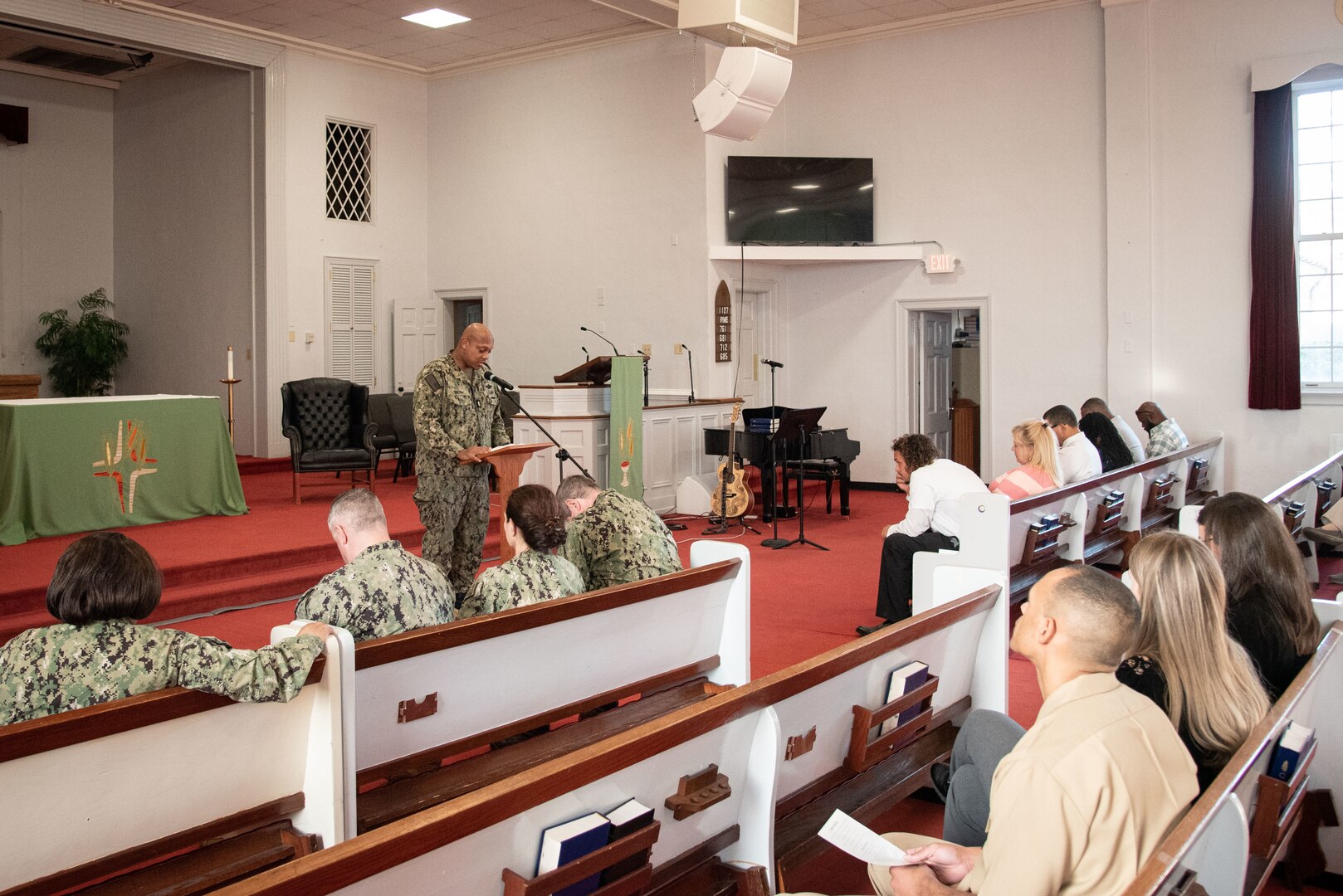 Chief Petty Officer Luis Brown speaks during the memorial ceremony for the late Ms. Gail Lindsey on Wednesday, February 15 aboard Marine Corps Air Station Cherry Point.  Lindsey was a civilian General Schedule staff member aboard Naval Health Clinic Cherry Point when she passed in late January, 2023.