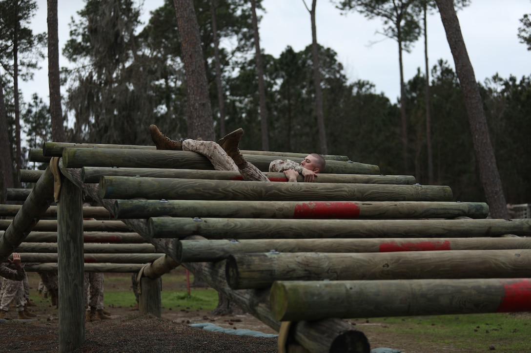 Recruits with Mike Company, 3rd Recruit Training Battalion, navigate the Confidence Course at Marine Corps Recruit Depot Parris Island, S.C., Feb. 21, 2023.

The Confidence Course is composed of various obstacles that both physically and mentally challenge recruits. (U.S. Marine Corps photo by Lance Cpl. Brenna Ritchie)