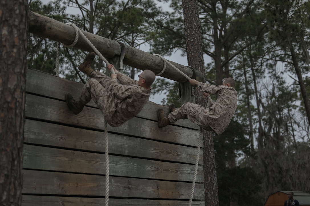 Recruits with Mike Company, 3rd Recruit Training Battalion, navigate the Confidence Course at Marine Corps Recruit Depot Parris Island, S.C., Feb. 21, 2023.

The Confidence Course is composed of various obstacles that both physically and mentally challenge recruits. (U.S. Marine Corps photo by Lance Cpl. Brenna Ritchie)