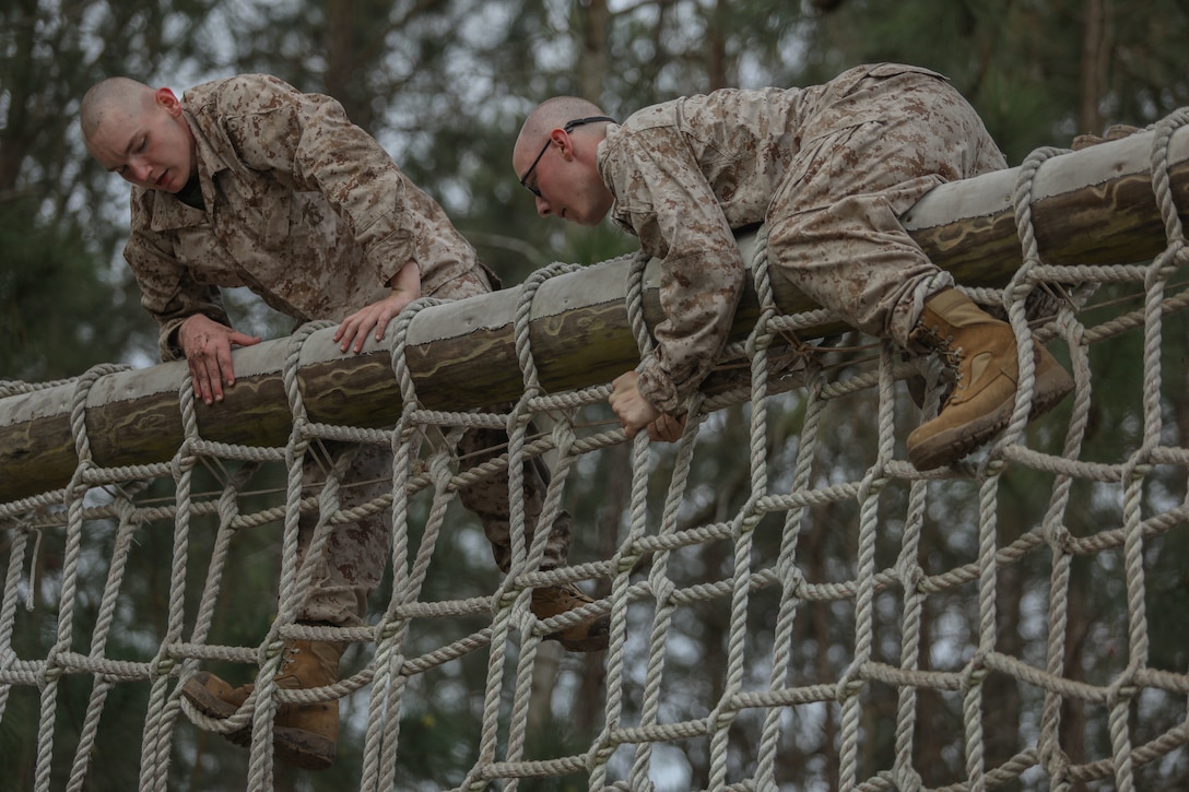 Recruits with Mike Company, 3rd Recruit Training Battalion, navigate the Confidence Course at Marine Corps Recruit Depot Parris Island, S.C., Feb. 21, 2023.

The Confidence Course is composed of various obstacles that both physically and mentally challenge recruits. (U.S. Marine Corps photo by Lance Cpl. Brenna Ritchie)