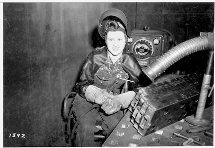 This World War II-era photo shows electric arc welder Midred Reed, Shop 26, Welders, one of three women at the time to attain a Third-Class-Welder Rating at then-Navy Yard Puget Sound, in Bremerton, Washington.