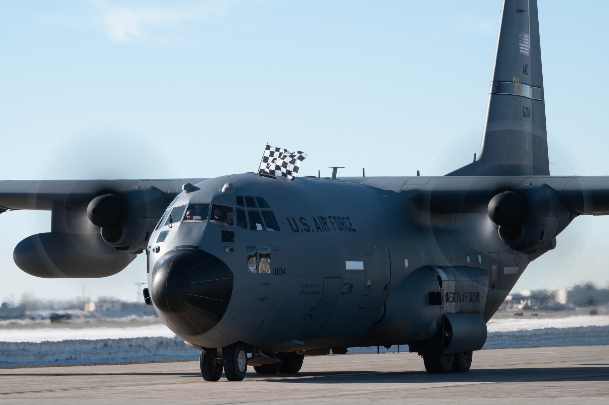 U.S. Air Force Col. James Cleet, 133rd Airlift Wing commander, taxies a C-130 Hercules during his fini-flight in St. Paul, Minn., Feb. 13, 2023.