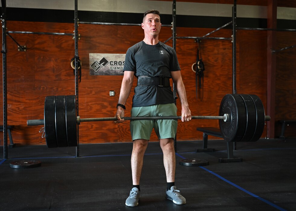 U.S. Air Force Capt. Matthew O’Neil, 17th Operational Medical Readiness Squadron general dentist, participates in a workout of the day at CrossFit Diamond Steel, San Angelo, Texas, Feb. 27, 2023. O’Neil worked hard daily to hit new fitness goals and encouraged his wingmen to do the same. (U.S. Air Force photo by Senior Airman Ethan Sherwood)