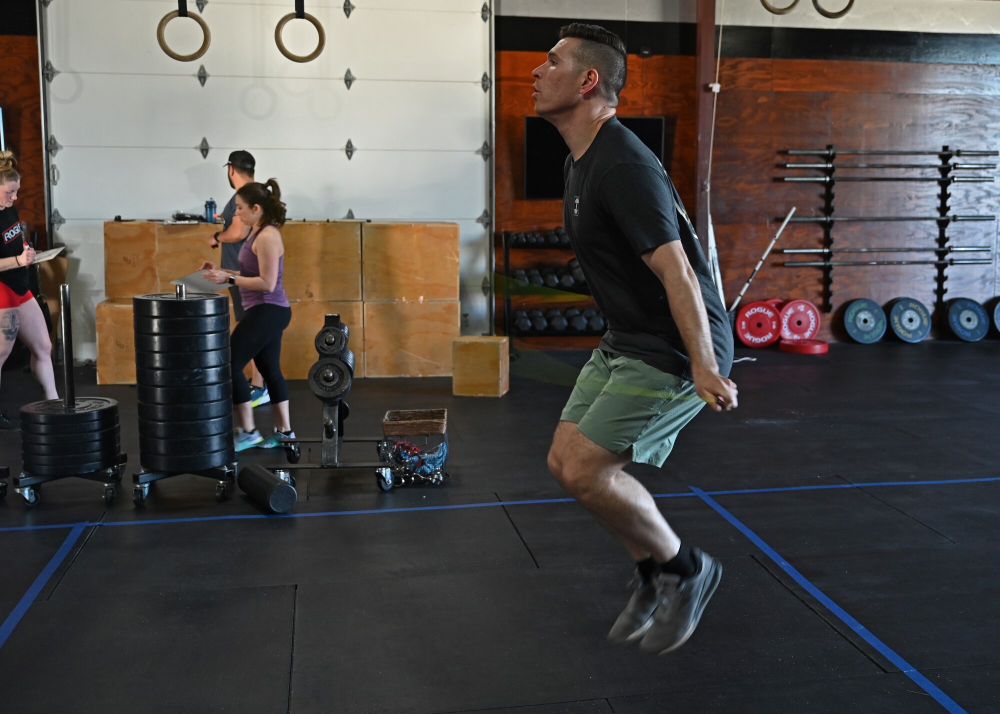 U.S. Air Force Capt. Matthew O’Neil, 17th Operational Medical Readiness Squadron general dentist, jumps rope during a workout of the day at CrossFit Diamond Steel, San Angelo, Texas, Feb. 27, 2023. O’Neil implemented his fitness expertise in workouts with his unit as the physical training leader. (U.S. Air Force photo by Senior Airman Ethan Sherwood)