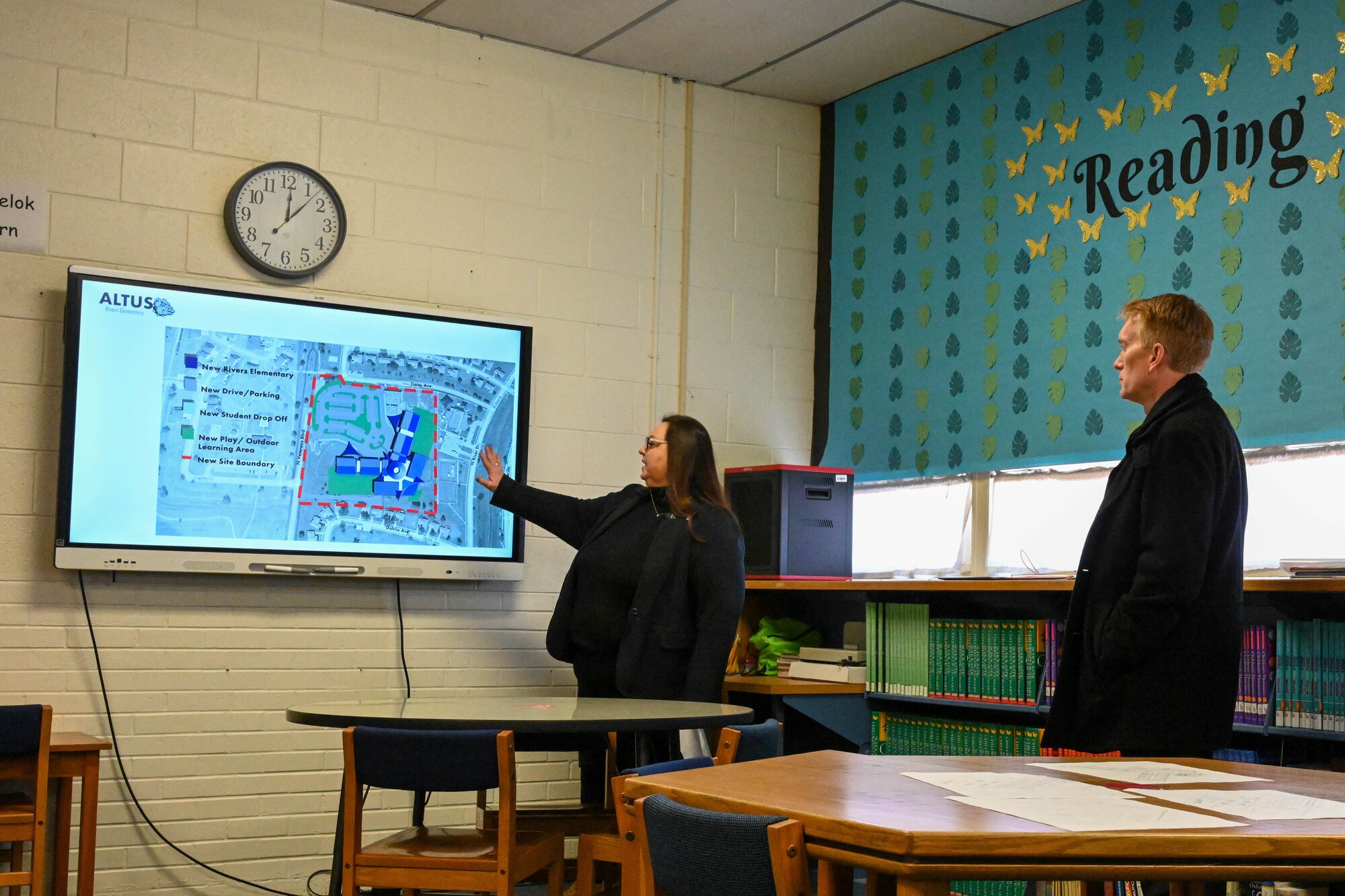 Robbie Holder, Altus Public Schools assistant superintendent, presents plans to U.S. Sen. James Lankford of Oklahoma for the new school on Altus Air Force Base, Oklahoma,  Feb. 23, 2023. The new school will replace the current school on base, L. Mendel Rivers Elementary School, which serves almost 400 military-connected students. (U.S. Air Force photo by Senior Airman Trenton Jancze)