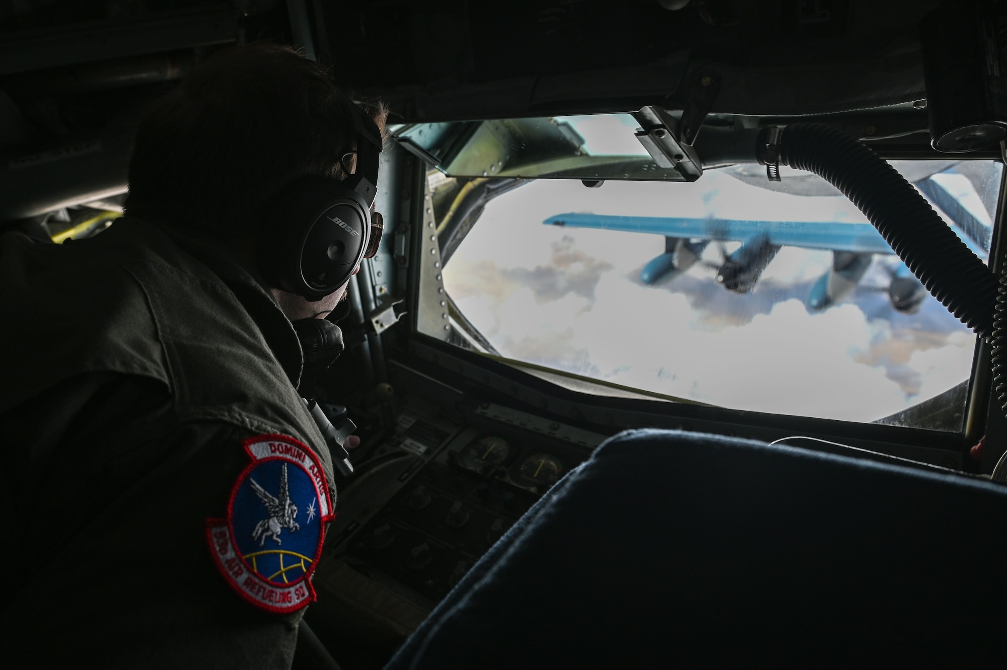 U.S. Air Force Airman 1st Class David Trulson, 93rd Air Refueling Squadron inflight refueling specialist, refuels a HC-130J Hercules during an aircrew endurance flight exercise at Roswell, New Mexico, Feb. 17, 2023. This exercise is an example of how the 92nd Air Refueling Wing is engaged, postured, and ready with credible force to assure, deter, and defend in an increasingly complex security environment. (U.S. Air Force photo by Airman 1st Class Haiden Morris)