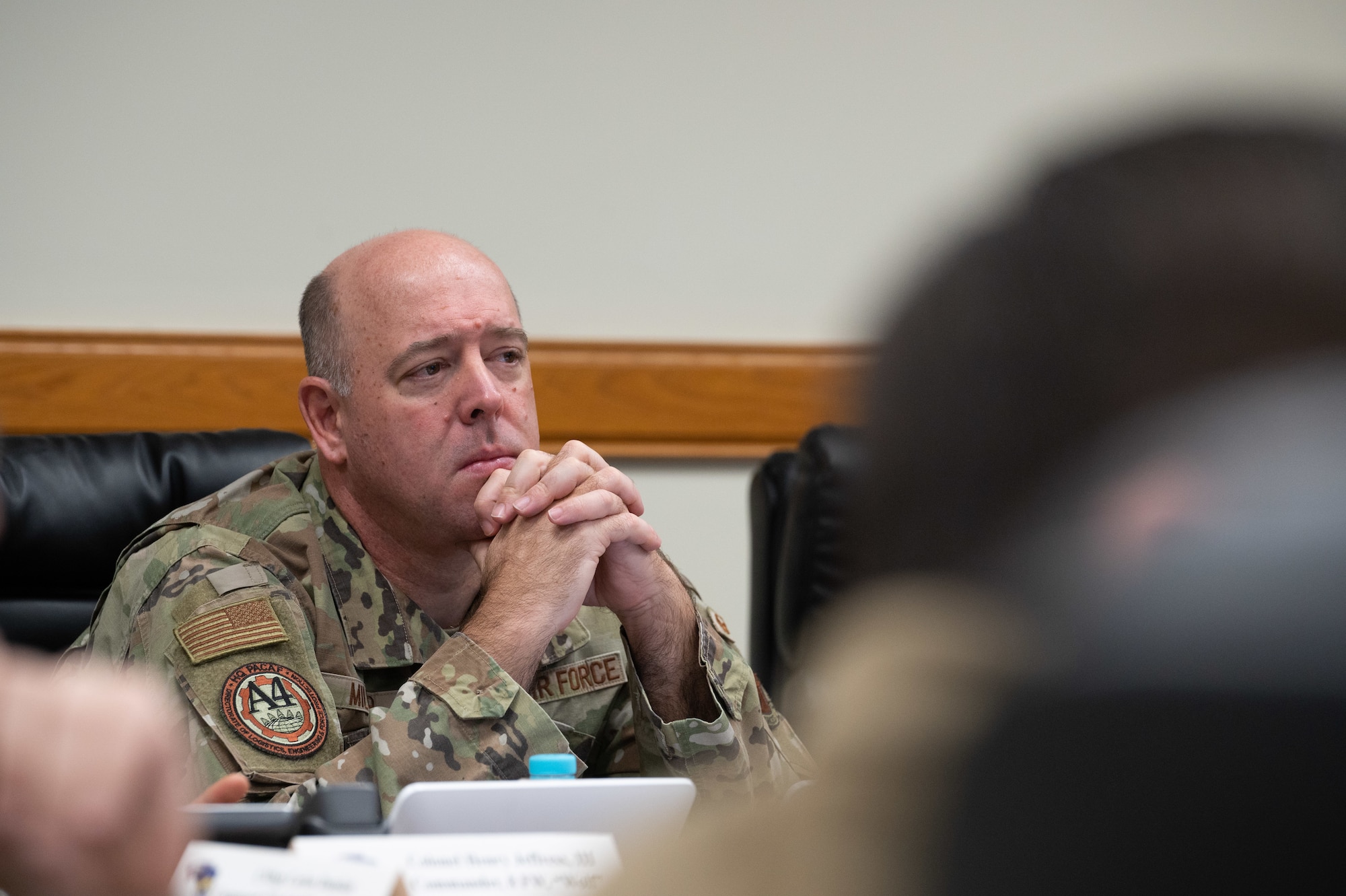 Col. Patrick Miller, Pacific Air Forces logistics, engineering and force protection director, listens to a mission brief, at Kunsan Air Base, Republic of Korea, Feb. 28, 2023. Prior to circulating throughout the unit and visiting with Airmen, Miller learned about the Wing’s current capabilities and innovating processes being implemented to further enhance mission productivity. (U.S. Air Force photo by Staff Sgt. Sadie Colbert)