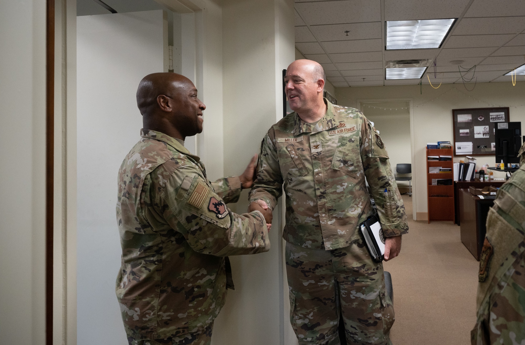 Col. Henry R. Jeffress III (left), 8th Fighter Wing commander, greets Col. Patrick Miller, Pacific Air Forces logistics, engineering and force protection director, at Kunsan Air Base, Republic of Korea, Feb. 28, 2023. Miller received a battlefield circulation tour to meet with Airmen at all levels to learn the state of their mission operations. (U.S. Air Force photo by Staff Sgt. Sadie Colbert)