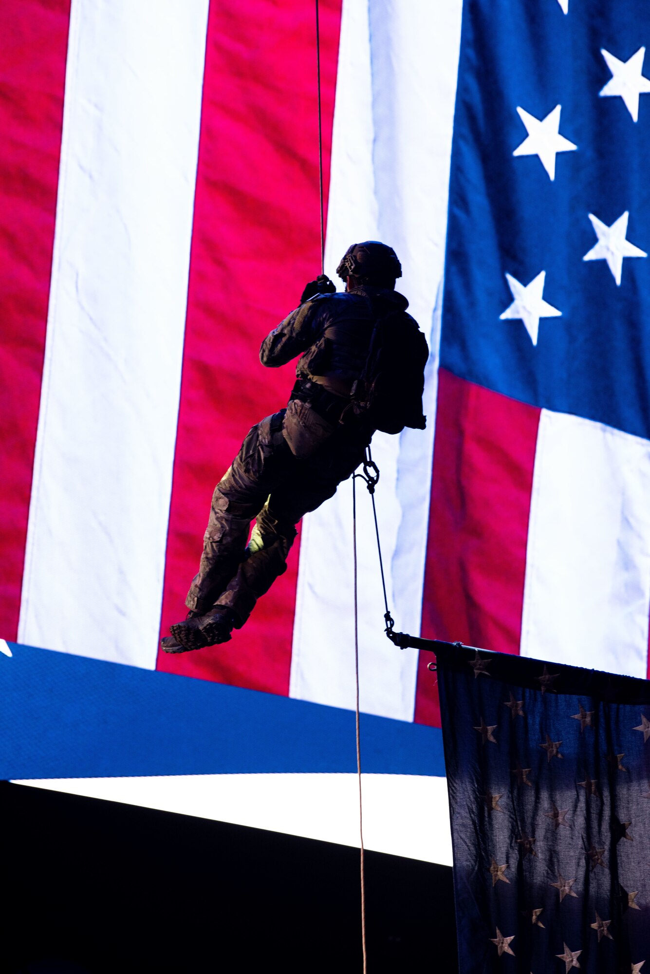 Special Warfare Training Wing Instructors rappel at the San Antonio Stock Show and Rodeo at the ATT Center in San Antonio Feb. 25, 2023.