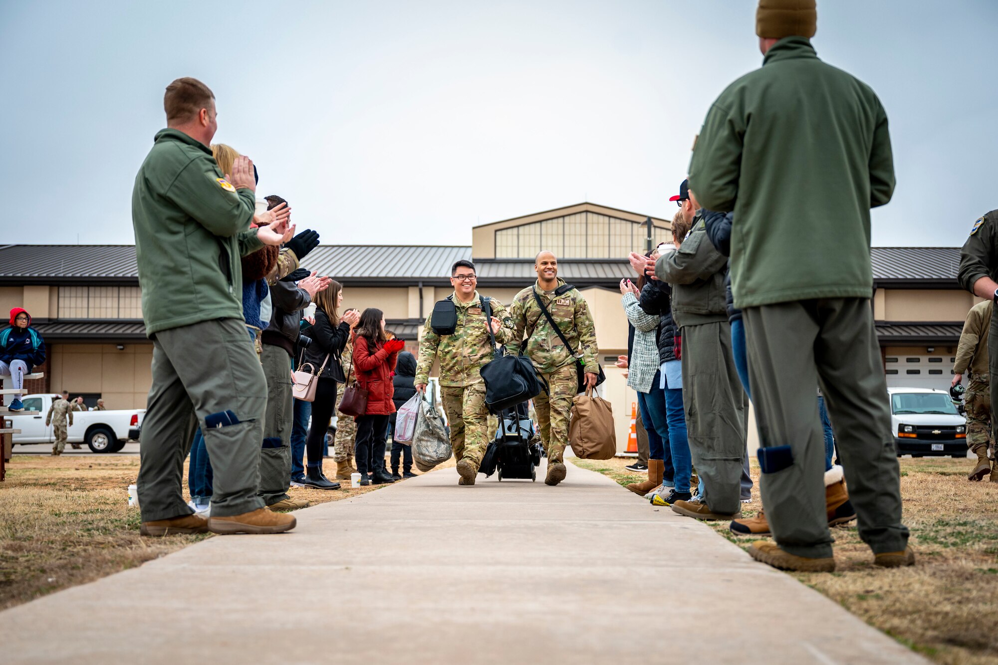 U.S. Air Force Airmen assigned to the 317th Airlift Wing receive a standing ovation before leaving for a deployment at Dyess Air Force Base, Texas, Feb. 25, 2023. Members from the 317th were deployed to the Middle East in support of the U.S. Central Command’s continued mission of enabling military operations and activities with allies and partners to increase regional security and stability in support of enduring U.S. interests. (U.S. Air Force photo by Senior Airman Leon Redfern)