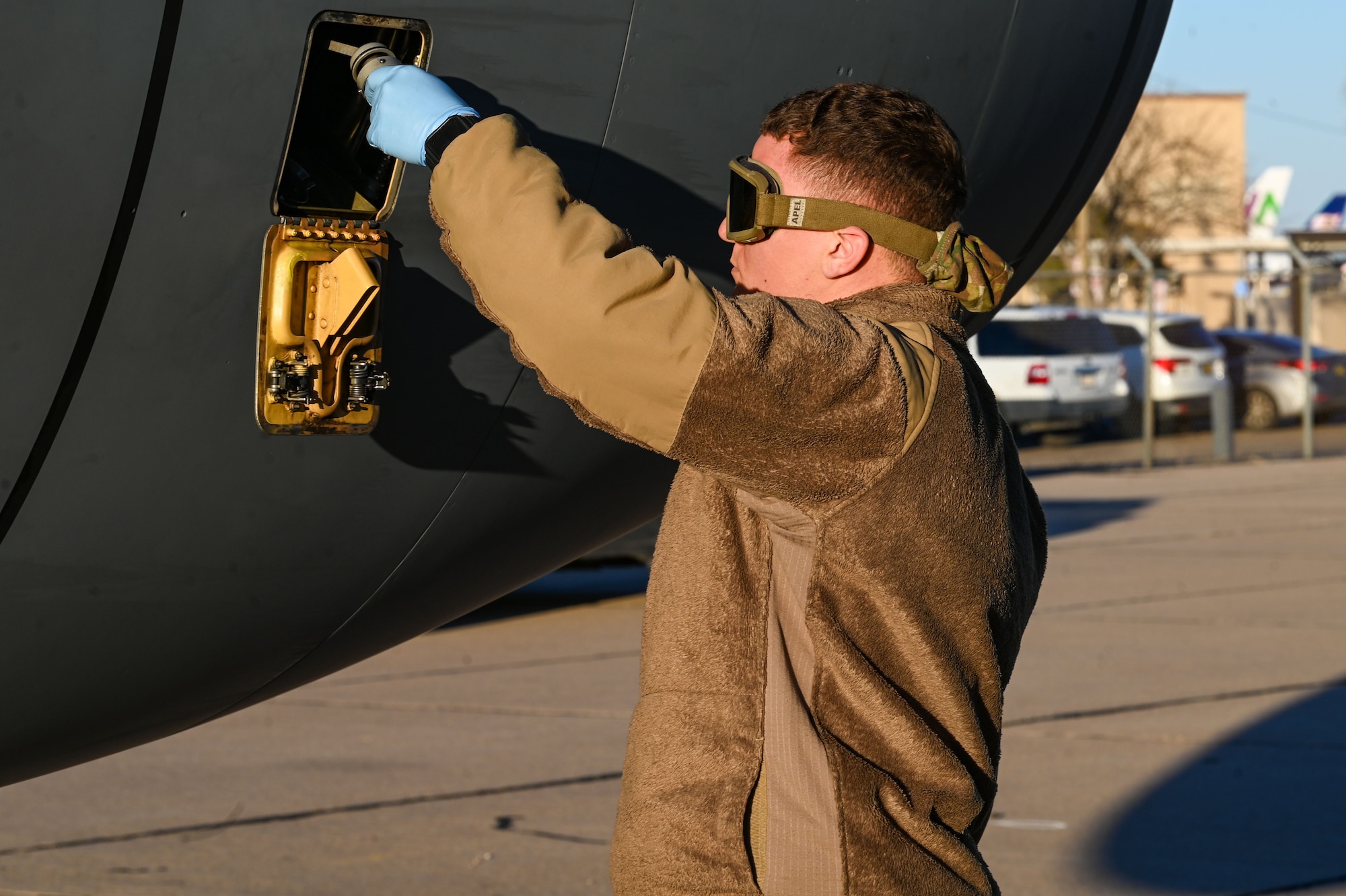 U.S. Air Force Senior Airman Randy Cruz, 92nd Aircraft Maintenance Squadron propulsion system apprentice, services a KC-135 Stratotanker after an endurance exercise at Roswell, New Mexico, Feb. 17, 2023. The 92nd Air Refueling Wing deployed personnel and KC-135 Stratotankers, to execute a Phase 2 Lead Wing exercise in preparation to be lead tanker wing at Air Mobility Command’s capstone exercise, Mobility Guardian 2023. (U.S. Air Force photo by Airman 1st Class Haiden Morris)