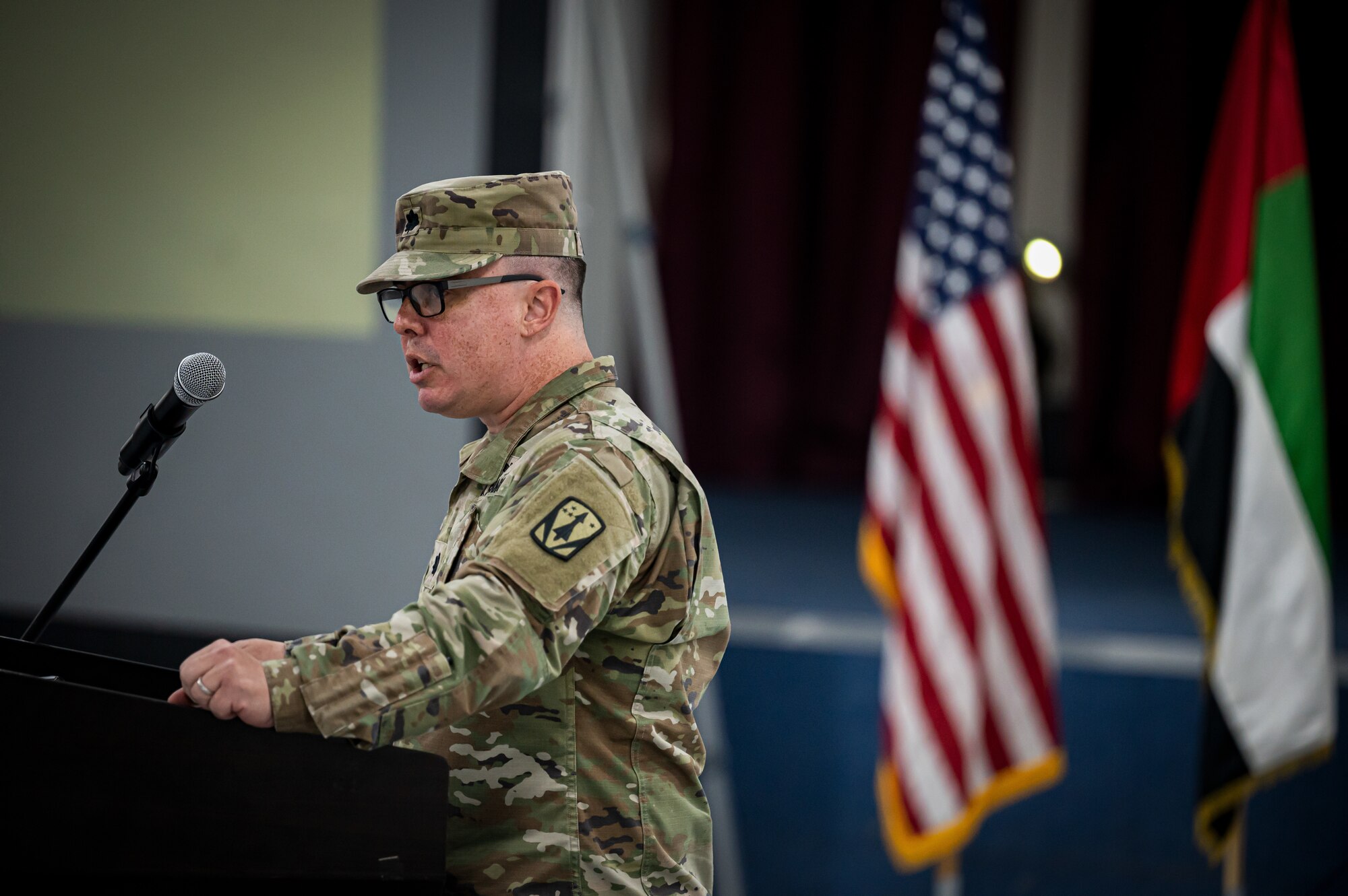 U.S. Army Lt. Col. Paul Mendoza, Commander of the 4th Battalion 3rd Air Defense Artillery Regiment (4-3 ADA), gives remarks at the 4-3 ADA Regiment Transfer of Authority to the 2nd Battalion 43rd Air Defense Artillery Regiment (2-43 ADA) on Jan. 26, 2023, Al Dhafra Air Base, United Arab Emirates. The 4-3 ADA redeployed to Ft. Sill, Oklahoma, following transferring command of the MIM-104 Patriot Missile Defense Systems at Al Dhafra AB to the 2-43 ADA.
