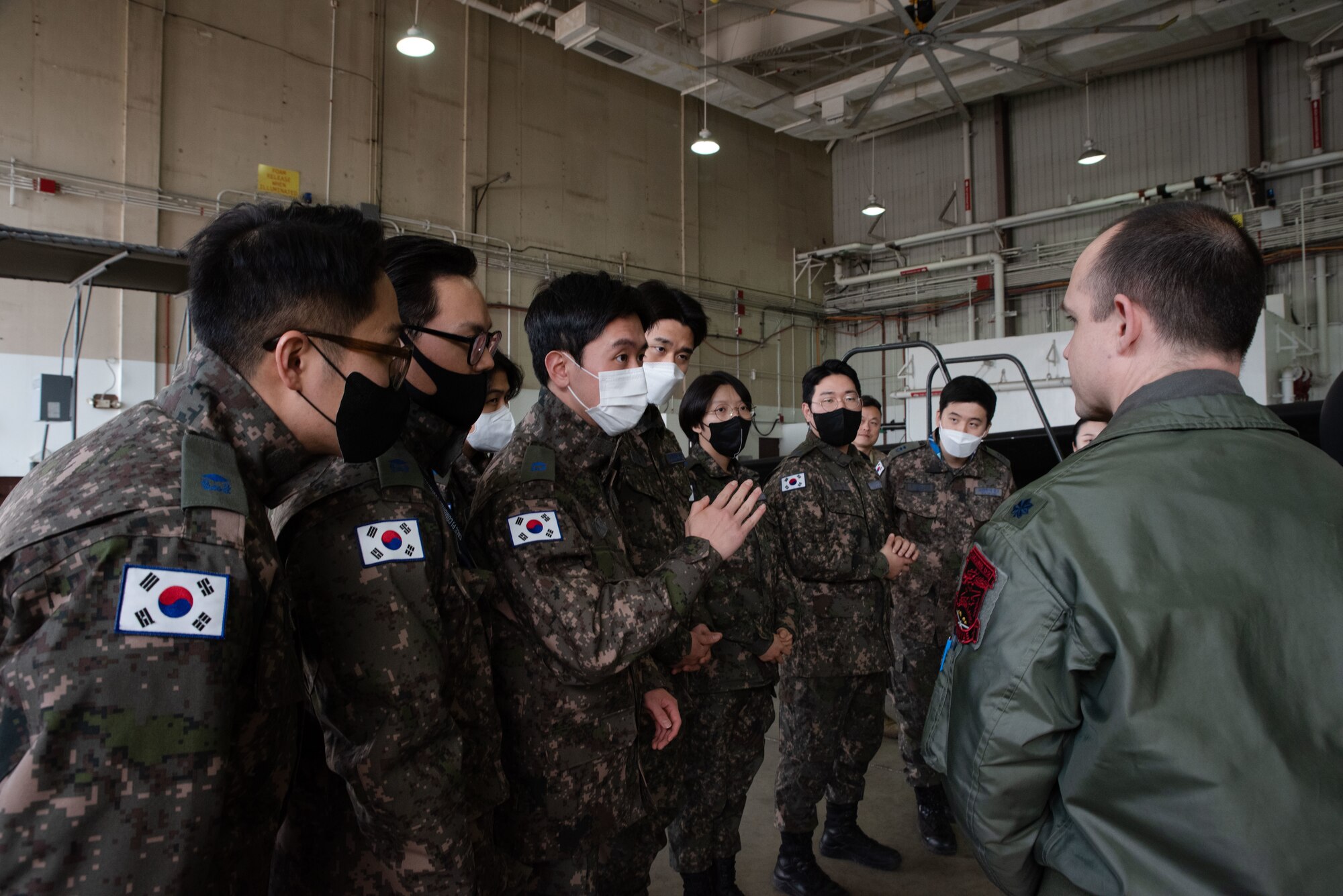 Republic of Korea Air Force 2nd Lt Jung Jae Wook, interpretation officer in training, inquires about a U-2S Dragon Lady during an immersion tour at Osan Air Base, ROK, Feb. 23, 2023.