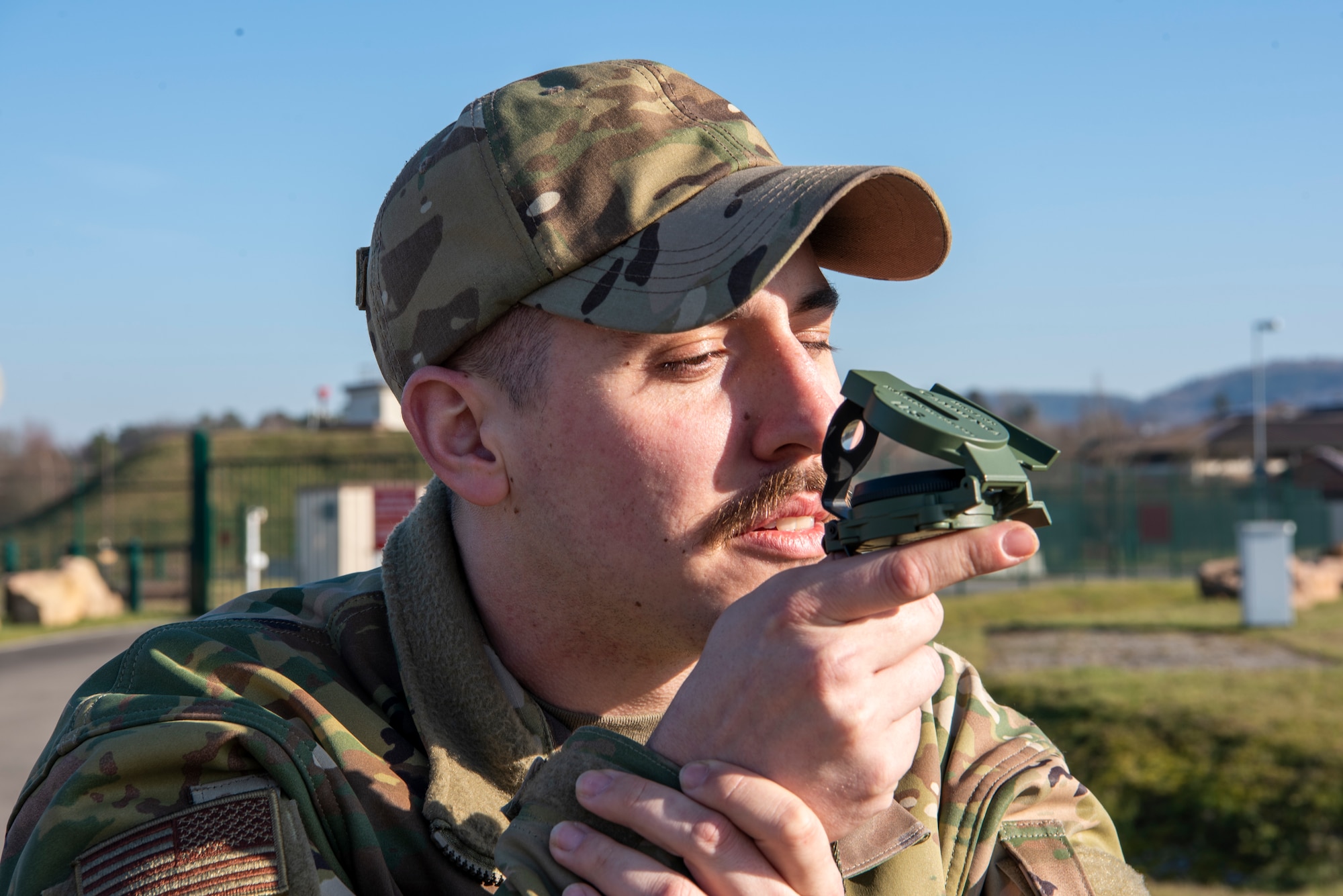 Airman holds compass