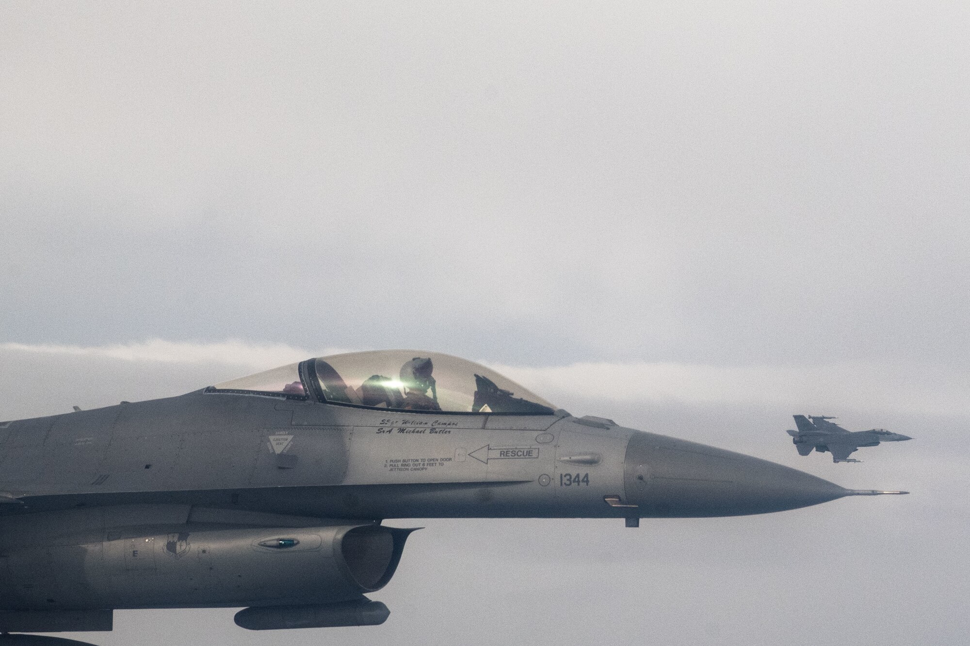 A U.S. Air Force F-16 Fighting Falcon assigned to the 480th Fighter Squadron at Spangdahlem Air Base, Germany, flies alongside a German air force Eurofighter Typhoon assigned to the 74th Tactical Air Wing over Germany, Feb. 16, 2023.