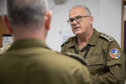 Colonel Ofer Margalit with the Megiddo Brigade, Israeli Defense Forces, engages in discussion during Juniper Falcon 2023, Feb. 12, 2023. JF23 is a bilateral exercise designed to improve the cooperative defense of Israel between the U.S. and the Israeli Defense Forces.