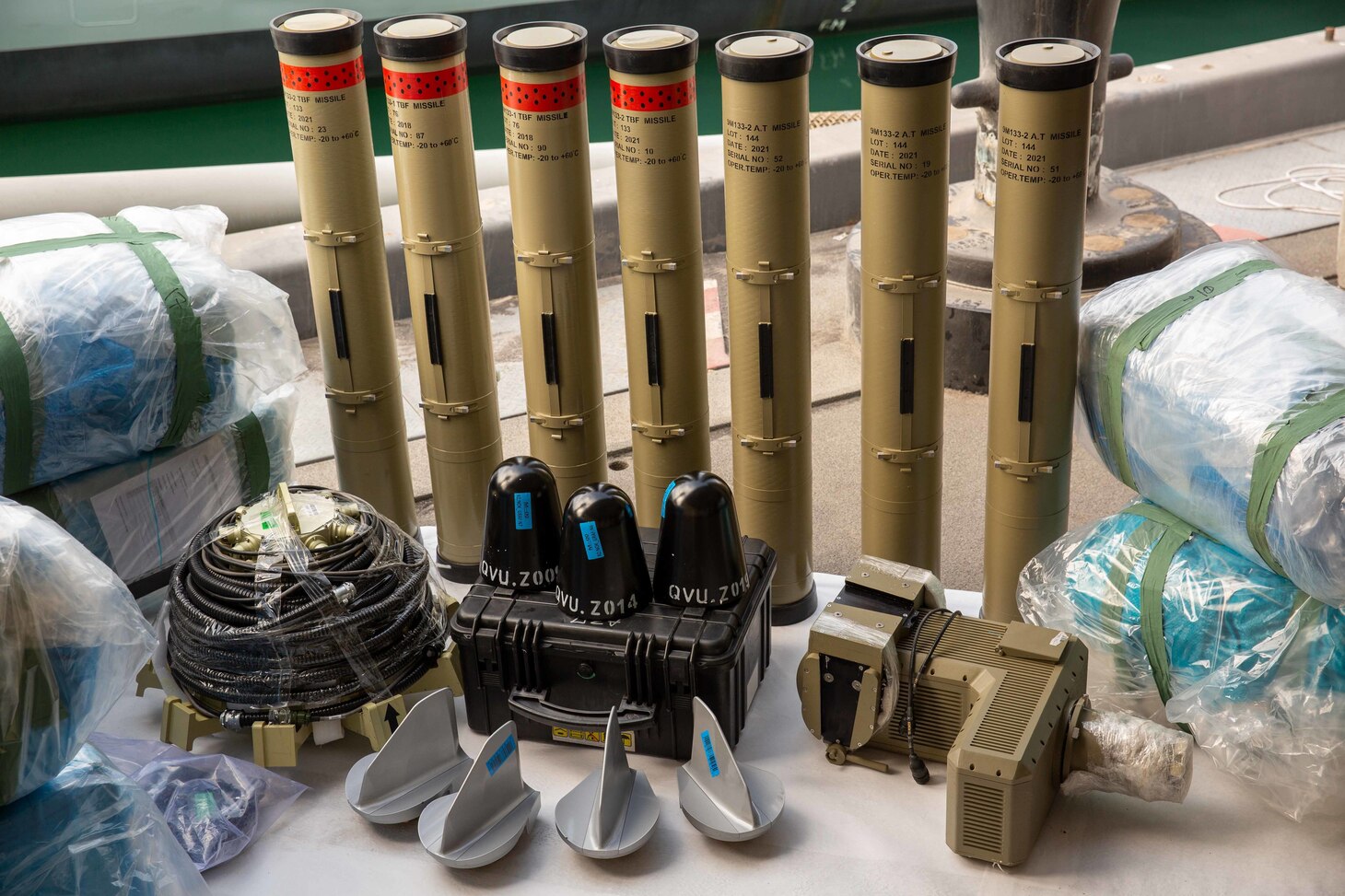 U.S. 5TH FLEET AREA OF OPERATIONS (Feb. 26, 2023) Anti-tank guided missiles and medium-range ballistic missile components seized by the United Kingdom Royal Navy sit pierside during inventory at a military facility in the U.S. 5th Fleet area of operations, Feb. 26, 2023.