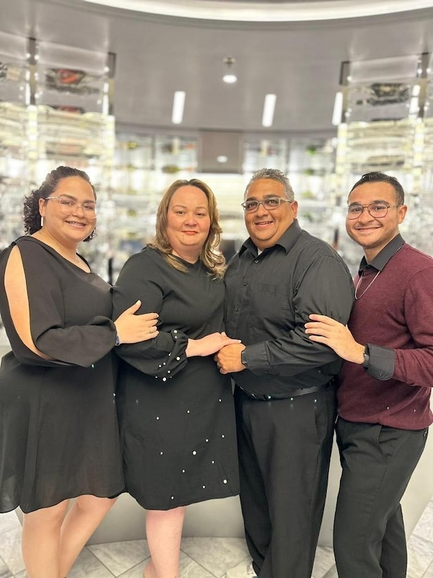 The Lopez Herrera family poses for a photo aboard Mediterranean Shipping Company Grandiosa, Nov. 10, 2022. (Courtesy photo by Lance Cpl. Kevin Lopez Herrera)
