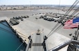 U.S. Marines with Combat Logistics Regiment 1, 1st Marine Logistics Group, drive a tactical vehicle onto the USNS Seay (T-AKR-302) during exercise Native Fury 22 at Yanbu Commercial Port, Kingdom of Saudi Arabia, Aug. 26, 2022. The Kingdom of Saudi Arabia enables the U.S. Marine Corps Central Command and U.S. Central Command to receive and employ forces and resources rapidly in the region through a growing network of western geographic access and staging points.