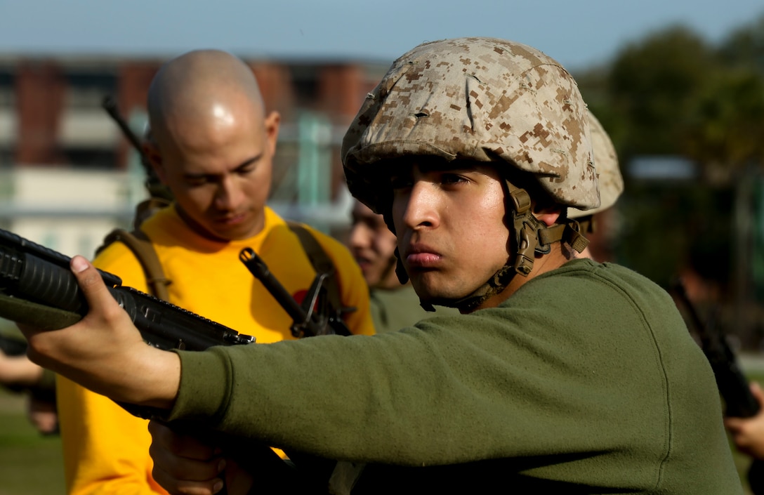 Recruits with Hotel Company, 3rd Recruit Training Battalion, practice Marine Corps Martial Arts Program aboard Marine Corps Recruit Training Depot, Parris Island, S.C., Feb. 8, 2023. The purpose of the  MCMAP is to execute unarmed and armed techniques using lethal and non-lethal force. (U.S. Marine Corps photo by Pfc. Mary R. Jenni)