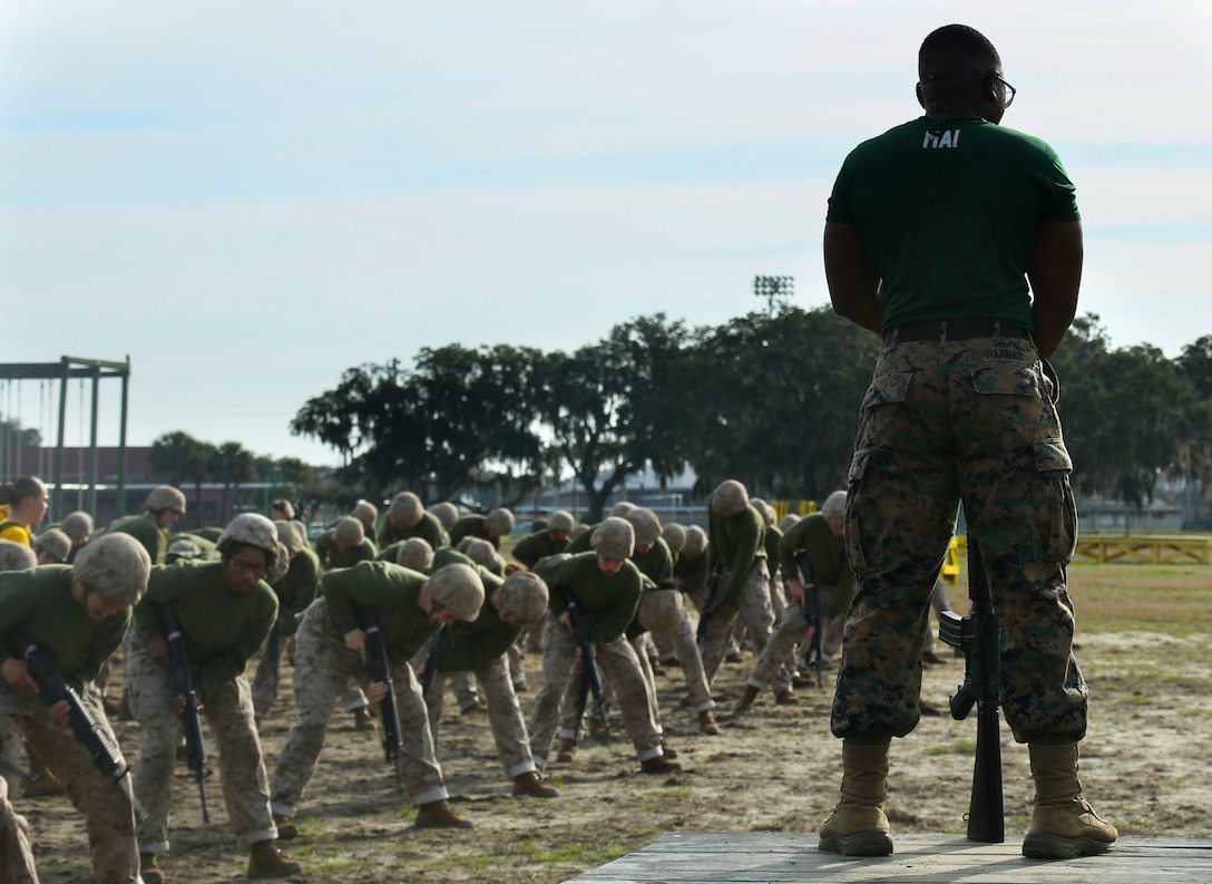 Recruits with Hotel Company, 3rd Recruit Training Battalion, practice Marine Corps Martial Arts Program aboard Marine Corps Recruit Training Depot, Parris Island, S.C., Feb. 8, 2023. The purpose of the  MCMAP is to execute unarmed and armed techniques using lethal and non-lethal force. (U.S. Marine Corps photo by Pfc. Mary R. Jenni)