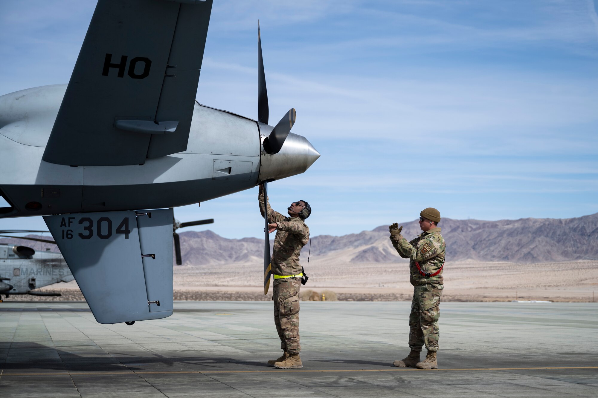 U.S. Air Force Staff Sgt. Shaun Shaffer, 29th Aircraft Maintenance Unit assisted dedicated crew chief, uses a Portable Aircraft Control Station at Marine Corps Air Ground Combat Command Center, Twentynine Palms, California, Feb. 16, 2023. Agile Combat Employment Reaper 23.6 is an exercise that was conducted between Holloman Air Force Base, Cannon AFB, N.M., Creech AFB, Nevada, and the U.S. Marines at Twentynine Palms. (U.S. Air Force photo by Staff Sgt. Kristin West)