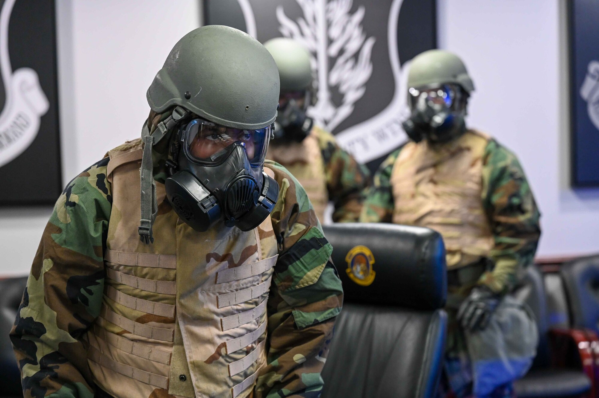 U.S. Air Force Staff Sgt. Alexis Ambures, 97th Communications Squadron communications focal point section supervisor, stands ready for the final readiness exercise to begin at Altus Air Force Base, Oklahoma, Feb. 23, 2023. The squadron was split into teams to sweep the area around their building for a simulated deployed exercise. (U.S. Air Force photo by Airman 1stClass Kari Degraffenreed)