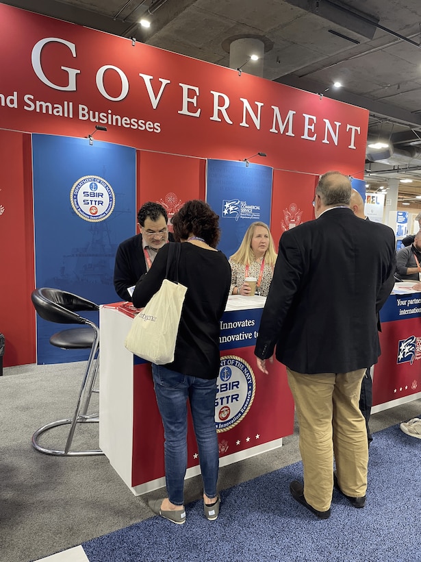 Navy Tabletop at USG Resources for Startups and Small Businesses at CES 2023, Las Vegas, Nevada

Pictured Left to Right: Antonio Rodriguez (Contractor Support) and Megan Stokes (Contractor Support)