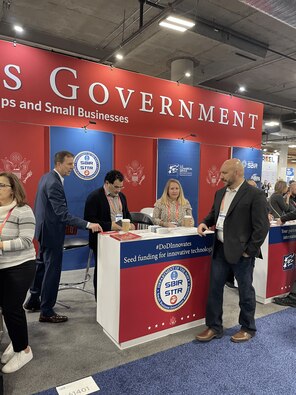 Navy Tabletop at USG Resources for Startups and Small Businesses at CES 2023, Las Vegas, Nevada

Pictured Left to Right: Brian Shipley (Navy SBIR/STTR Commercialization PM), Antonio Rodriguez (Contractor Support), Megan Stokes (Contractor Support), and Michael Pyryt (Navy SSP SBIR/RIF PM).