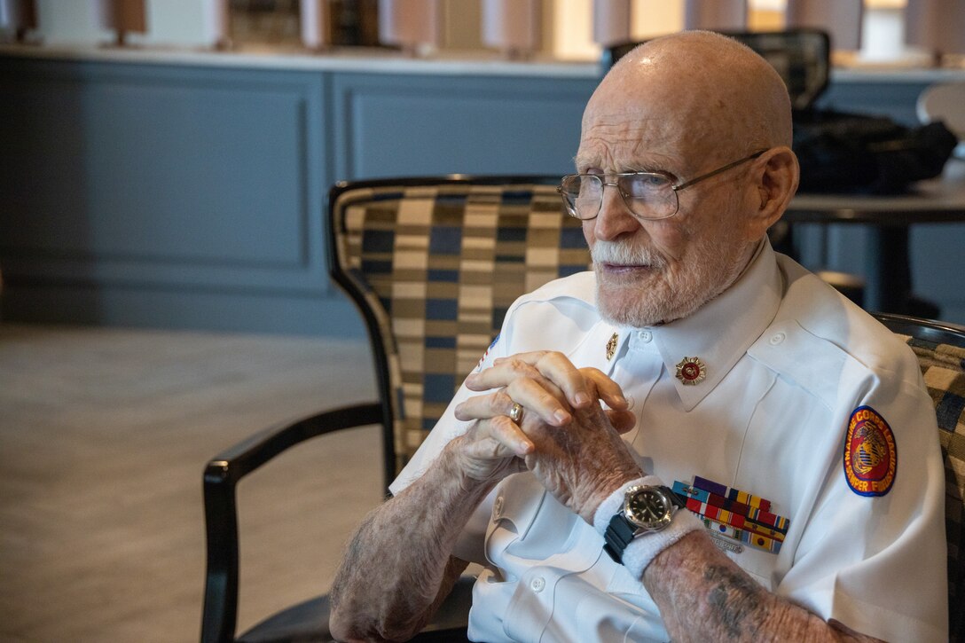 U.S. Marine Corps veteran Glenn Galtere, a 93-year-old Marine who fought in The Battle of Chosin Reservoir in the Korean War, tells his Marine Corps story at the Iwo Jima Luncheon held at The Madyson at Palm Beach Gardens, Florida, Feb. 23, 2023. The Iwo Jima Luncheon was organized by U.S. Marine Corps veterans Joe Lisi and Tom Kane, together with Madyson staff members to honor those who answered the call of duty for the defense of our nation. (U.S. Marine Corps photo by Lance Cpl. Kevin Lopez Herrera)