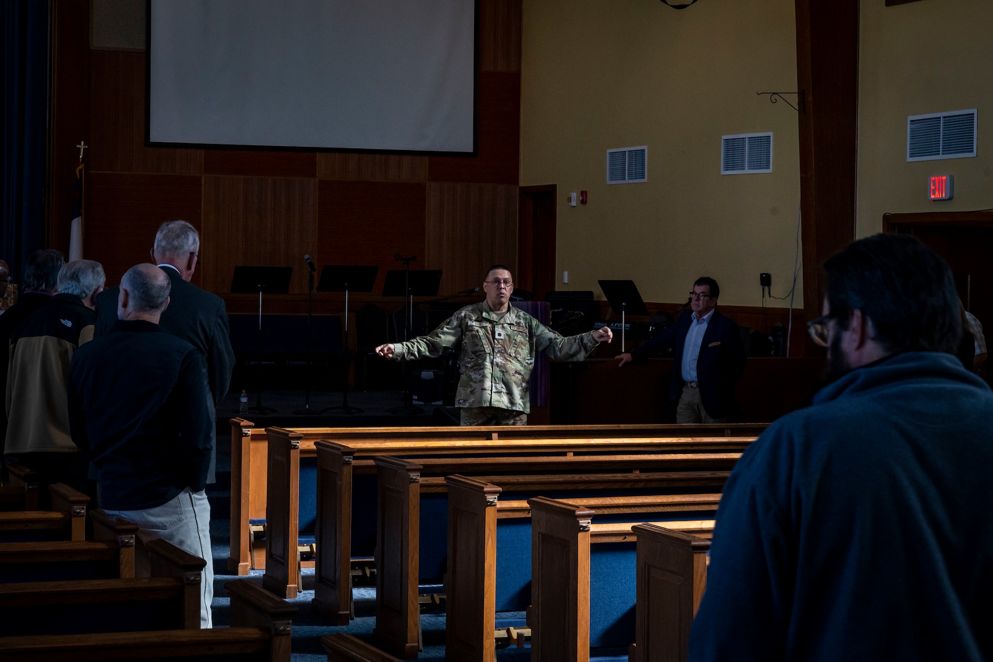 U.S. Air Force Lt. Col. Gabriel Rios 7th Bomb Wing chaplain, welcomes local religious leaders to the Dyess Clergy Day tour at Dyess Air Force Base, Texas, Feb. 28, 2023. Clergy Day is an annual event the Dyess AFB Chaplain Corps hosts to forge rapport and relationships with local clergy of all faith backgrounds who support the Dyess community. (U.S. Air Force photo by Senior Airman Leon Redfern)