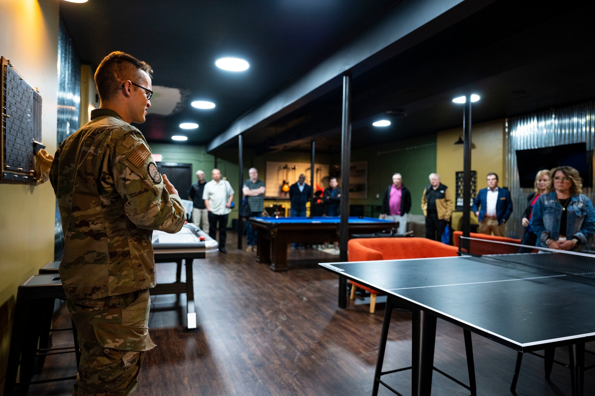 U.S. Air Force Senior Airman Dustin Brooks, Dyess We Care team member, briefs local religious leaders on the newly renovated Soul Fire Cafe during the Dyess Clergy Day tour at Dyess Air Force Base, Texas, Feb. 28, 2023. Clergy Day is an annual event the Dyess AFB Chaplain Corps hosts to forge rapport and relationships with local clergy of all faith backgrounds who support the Dyess community. (U.S. Air Force photo by Senior Airman Leon Redfern)