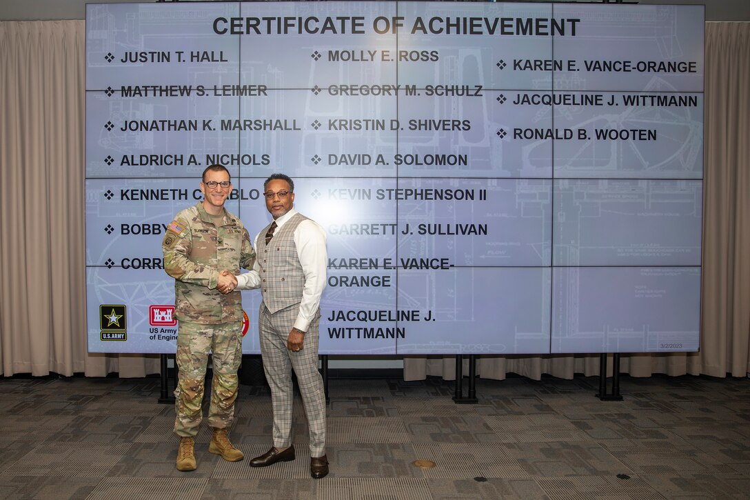 U.S. Army Corps of Engineers (USACE) Galveston District Commander Col. Rhett Blackmon [left] recognizes Aldrich Nichols with a Certificate of Achievement during an awards ceremony, March 2, 2023.

The ceremony recognized employees for their significant individual achievements and group accomplishments during the second quarter of Fiscal Year 2023.