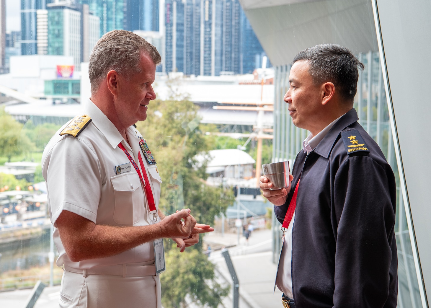 Adm. Samuel Paparo and Major-General Kelvin Khong Boon Leong conduct a bilateral discussion.