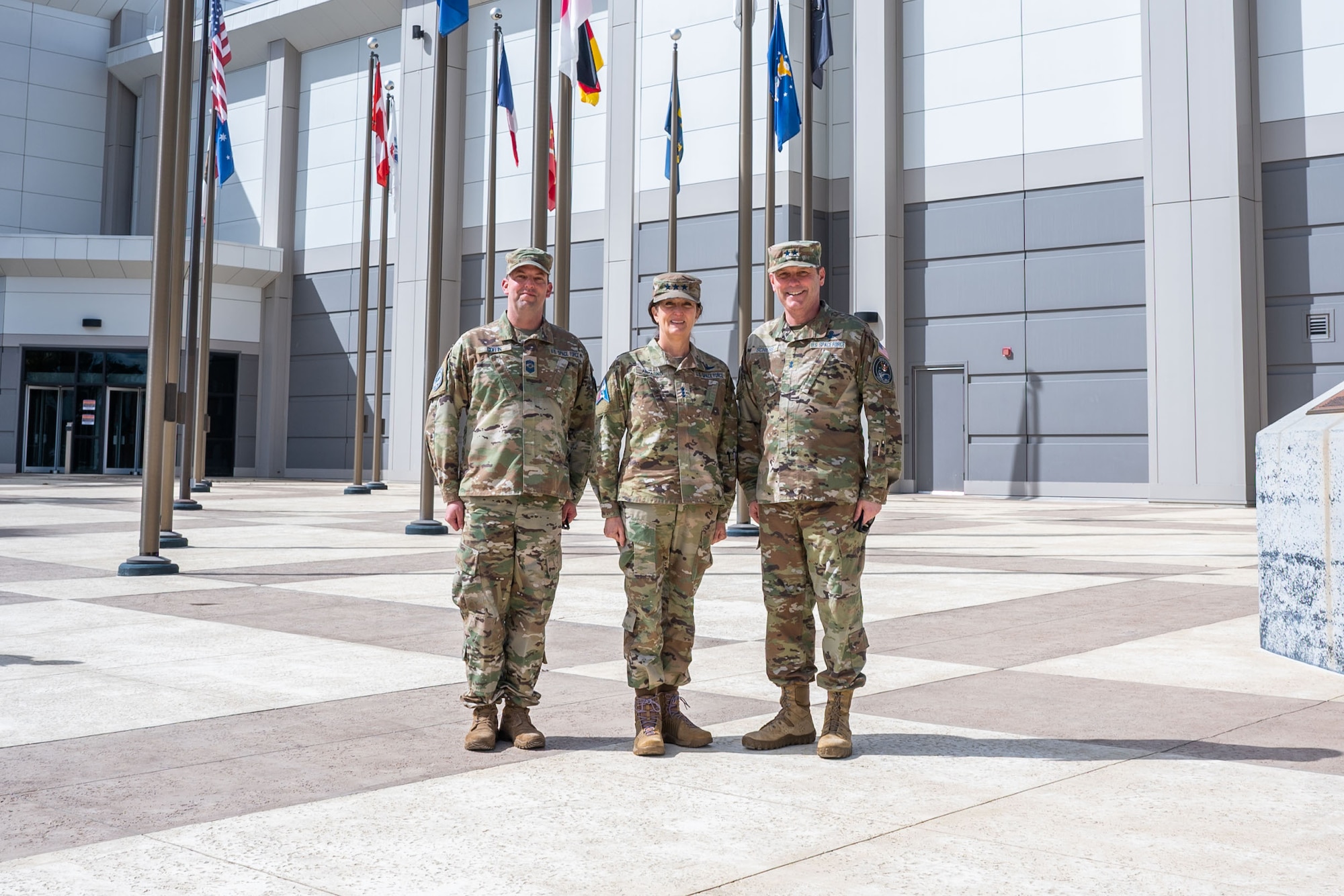U.S. Space Force Lt. Gen. Nina M. Armagno (center), U.S. Space Force Director of Staff, poses for a photo with U.S. Space Force Maj. Gen. Douglas A. Schiess (right), Combined Force Space Component Command commander, and U.S. Space Force Chief Master Sgt. Grange S. Coffin (left), CFSCC senior enlisted leader, during a visit to Vandenberg Space Force Base, CA, Feb. 23, 2023. During her visit to the CFSCC headquarters, Armagno met with CFSCC members and toured the Combined Space Operations Center. (U.S. Space Force photo by Tech. Sgt. Luke Kitterman)