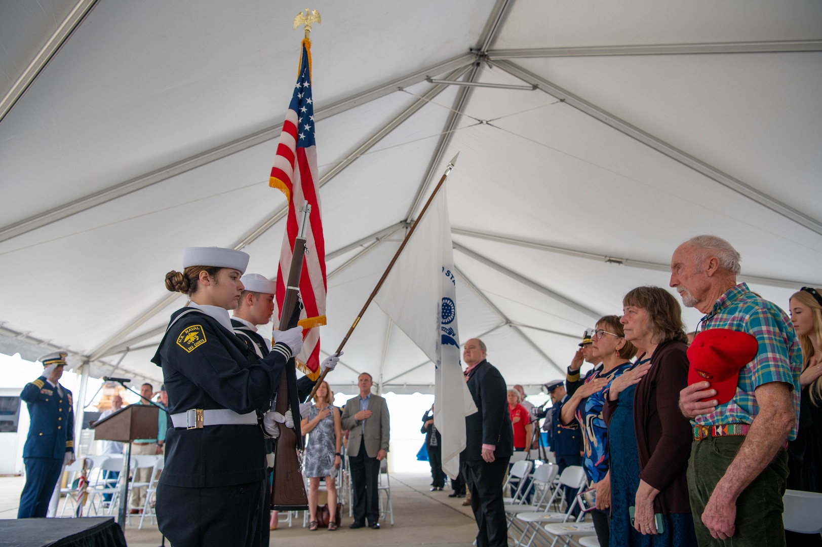 Members of the U.S. Naval Sea Cadets ceremonial honor guard present the colors to begin the Coast Guard Cutter Decisive’s decommissioning ceremony in Pensacola, Florida, March 2, 2023. During the ceremony, the Coast Guard retired Decisive after its 55 years of dedicated service. (U.S. Coast Guard photo by Petty Officer 2nd Class Jose Hernandez)