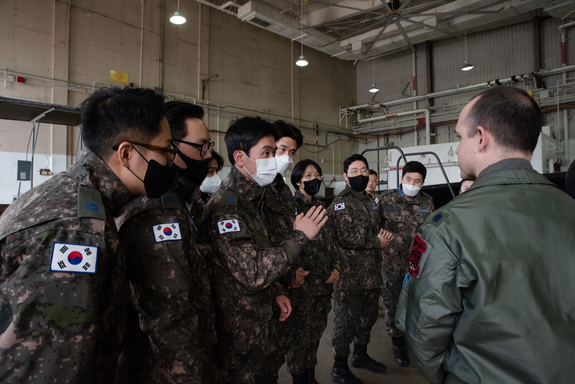 Republic of Korea Air Force 2nd Lt Jung Jae Wook, interpretation officer in training, inquires about a U-2S Dragon Lady during an immersion tour at Osan Air Base, ROK, Feb. 23, 2023.