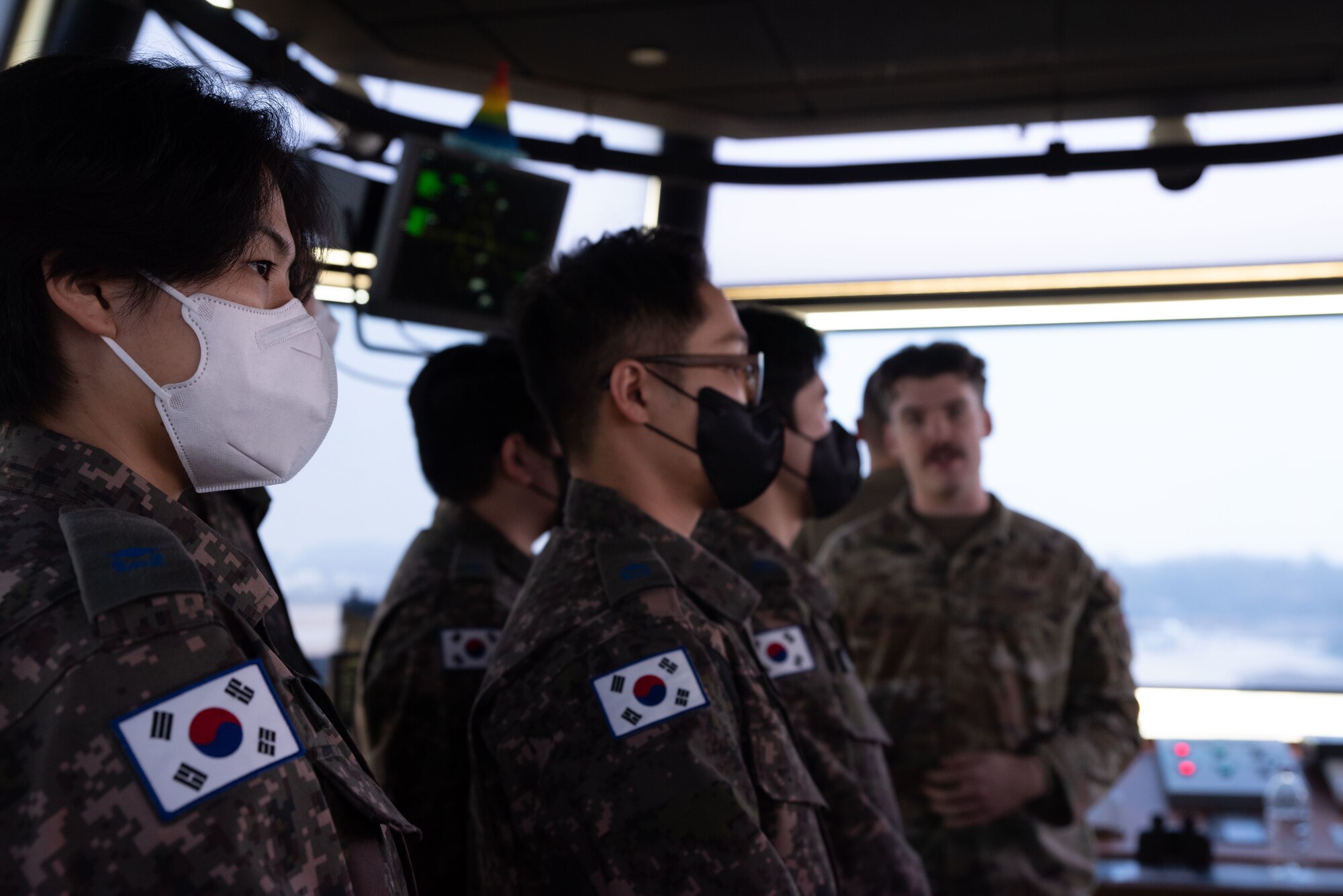 Republic of Korea Air Force interpretation officers in training learn about air traffic controllers and their duties during an immersion tour at Osan Air Base, ROK, Feb. 23, 2023.