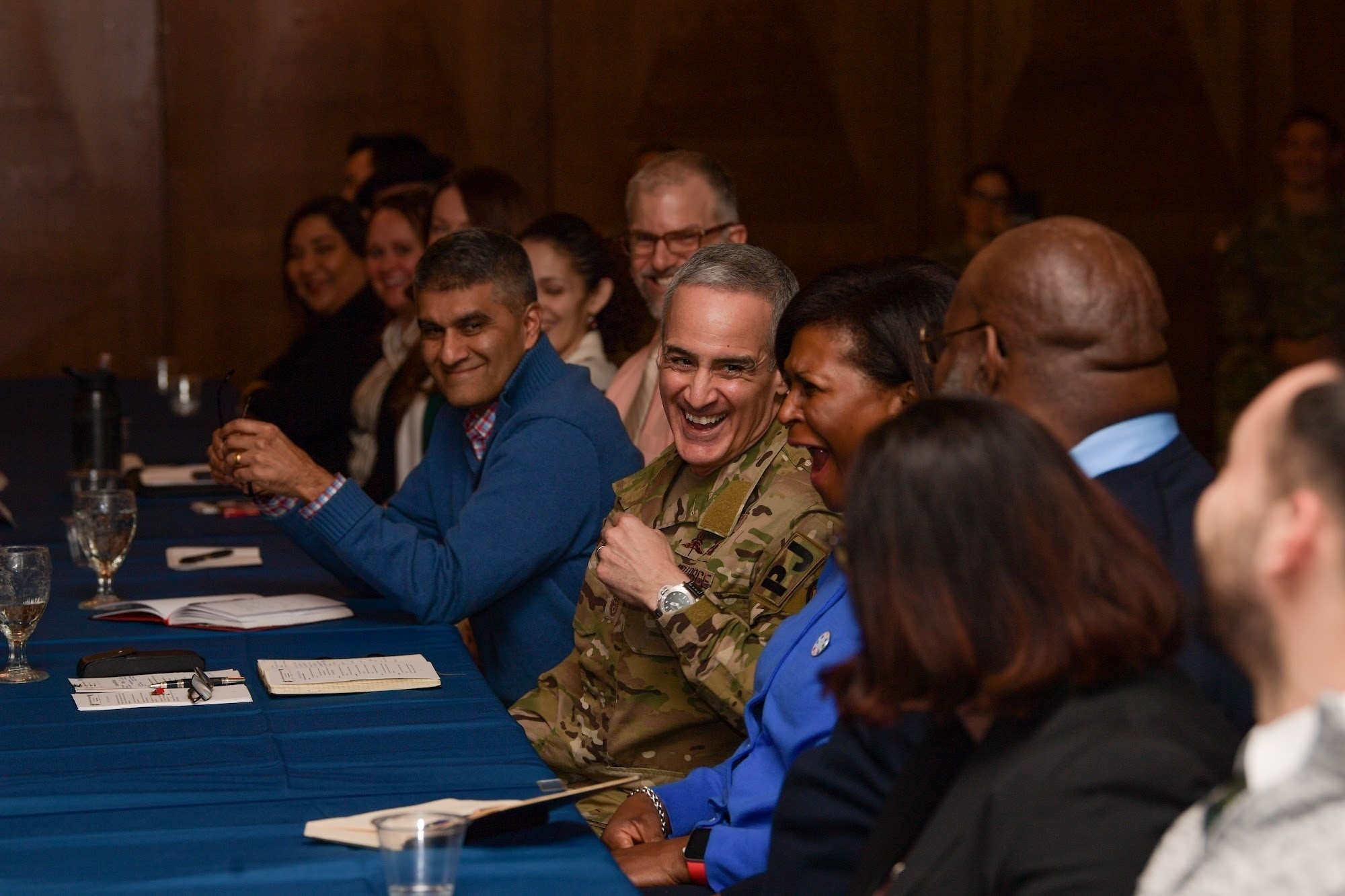Senior Enlisted Advisor to the Chairman Ramon “CZ” Colon-Lopez, laughs with members while participating in a round-table discussion at Ramstein Air Base, Germany, March 1, 2023.