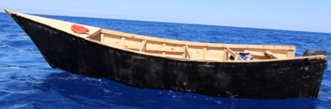 An illegal voyage vessel carrying 39 Haitians and two Dominicans sits empty in the Mona Passage after the Coast Guard Cutter Richard Dixon safely embarked the migrants shortly after interdicting the vessel near Monito Cay, Puerto Rico, March 2, 2023. The interdictions is the result of ongoing local and federal multi-agency efforts in support of the Caribbean Border Interagency Group CBIG. (U.S. Coast Guard photo)