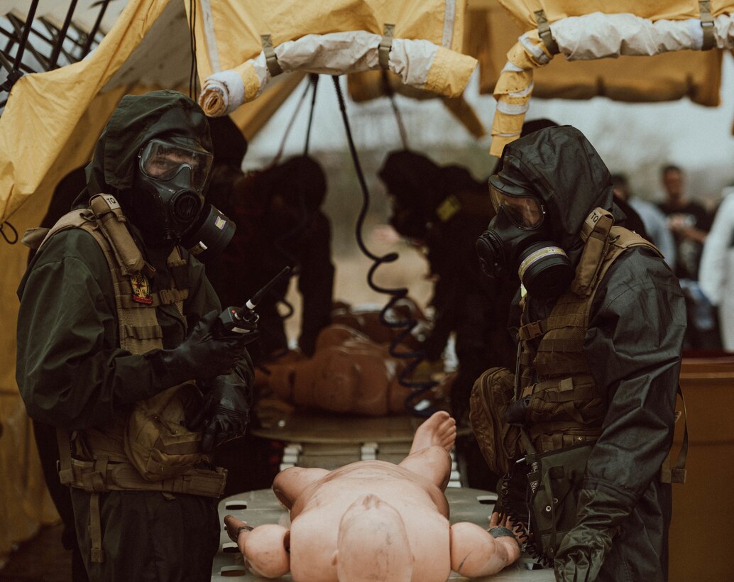 Members of the decontamination team, assigned to the Marine Corps Chemical, Biological Incident Response Force, practice decontaminating a mannequin during Exercise Sudden Response 23 at Fort Hood, Texas Dec. 11, 2022. Military units comprising the Defense CBRN Response Force  participated in Exercise Sudden Response 23 Dec. 7-13 in Camp Mabry, Austin and Fort Hood, Texas. Teams from Task Force Aviation, TF Logistics, TF Medical and TF Operations, rehearsed force and equipment employment, life-saving operations and web-based collaborative tools to ensure their ability to execute Defense Support of Civil Authority mission. The DCRF is comprised of up to 5,200 personnel from military units located throughout the nation who come   together to help fellow Americans in the event of a catastrophic crisis response.