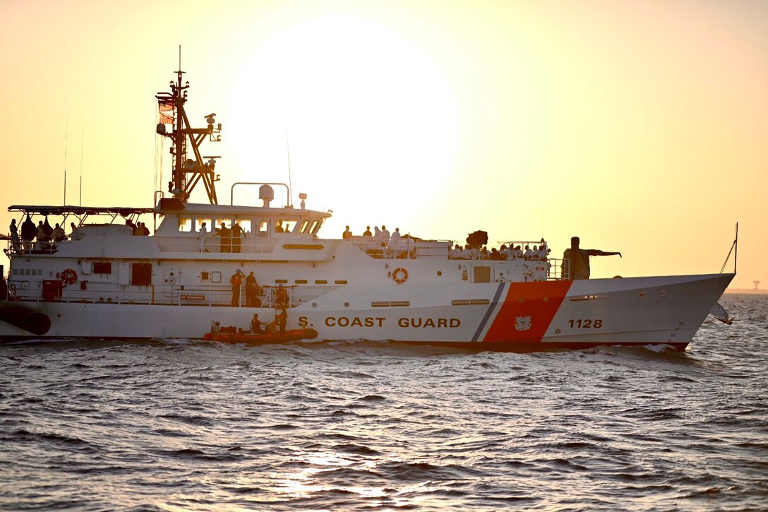 Haitian migrants are transferred from a Coast Guard small boat to Coast Guard Cutter Manowar, off Florida's coast, Feb. 28, 2023. The people were repatriated to Haiti on March 3, 2023. (U.S. Coast Guard photo by Senior Chief Petty Officer Brodie MacDonald)