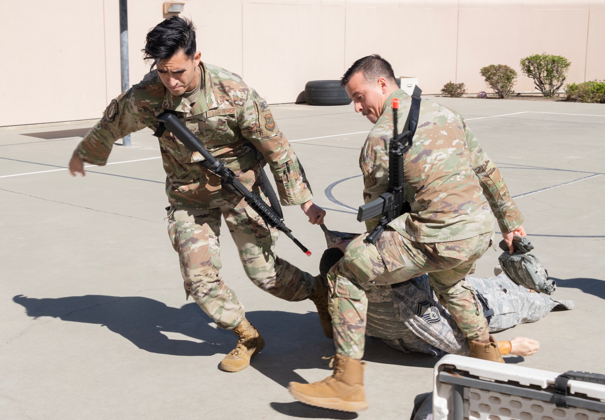 Airmen drag mannequin